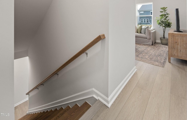 1525 Tamarisk Ln, Durham, NC 27703 - staircase featuring baseboards and wood finished floors
