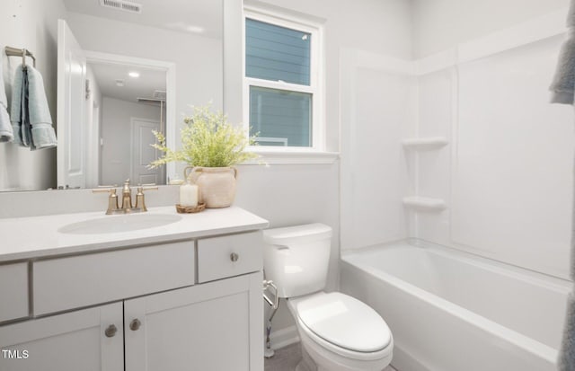 1525 Tamarisk Ln, Durham, NC 27703 - bathroom featuring toilet, vanity, and shower / bath combination