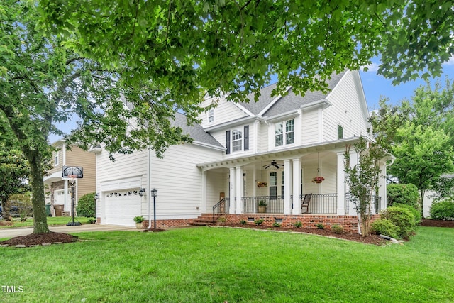 106 Roundtop Rd, Cary, NC 27519 - view of front of house featuring a porch, a front yard, concrete driveway, a shingled roof, and a ceiling fan