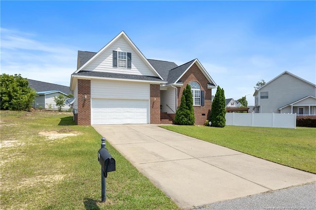 5511 Shady Lawn Dr, Hope Mills, NC 28348 - traditional-style home with brick siding, driveway, and roof with shingles