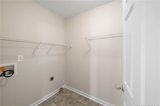 5511 Shady Lawn Dr, Hope Mills, NC 28348 - laundry area with hookup for an electric dryer, baseboards, and hookup for a washing machine