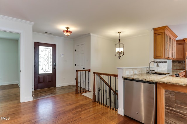 325 Northfield Dr, Raleigh, NC 27609 - entryway featuring wood finished floors, baseboards, beverage cooler, and crown molding