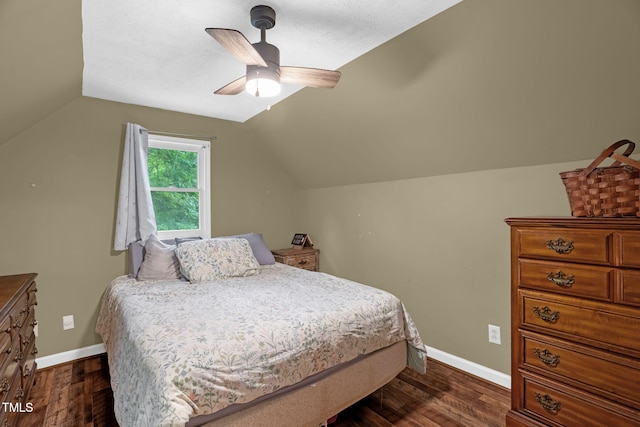 1869 Brevard Rd, Graham, NC 27253 - bedroom featuring lofted ceiling, dark wood-style floors, baseboards, and a ceiling fan