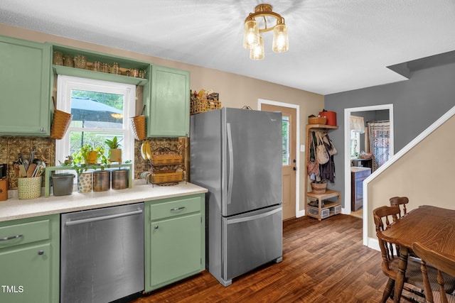 1869 Brevard Rd, Graham, NC 27253 - kitchen featuring stainless steel appliances, light countertops, backsplash, and green cabinetry