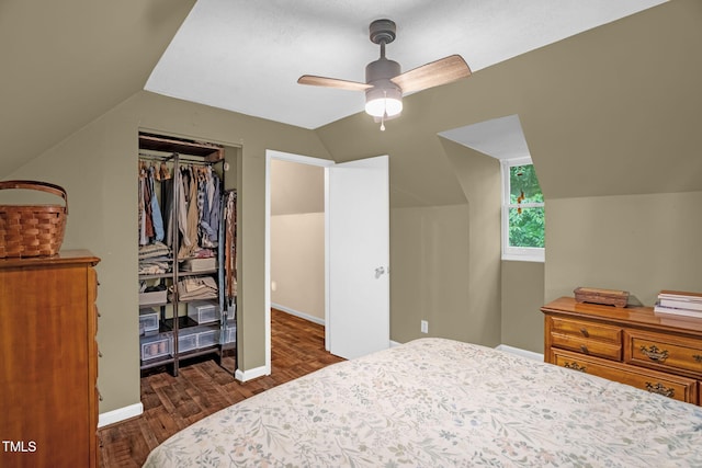 1869 Brevard Rd, Graham, NC 27253 - bedroom with lofted ceiling, dark wood-style flooring, a closet, a ceiling fan, and baseboards