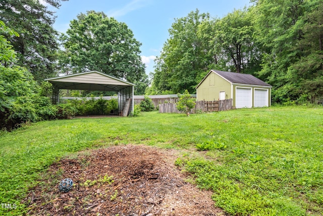 1869 Brevard Rd, Graham, NC 27253 - view of yard with a detached garage, a carport, and an outdoor structure