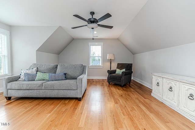 104 Crosby Ln, Sanford, NC 27330 - living area featuring light wood-style floors, ceiling fan, baseboards, and vaulted ceiling