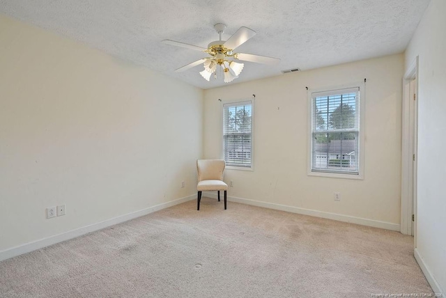 1314 Four Wood Dr, Fayetteville, NC 28312 - carpeted empty room featuring a textured ceiling, baseboards, and ceiling fan