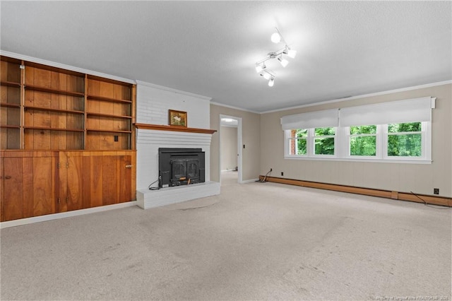 472 Walter Bright Rd, Sanford, NC 27330 - unfurnished living room with carpet flooring, crown molding, baseboard heating, a textured ceiling, and baseboards