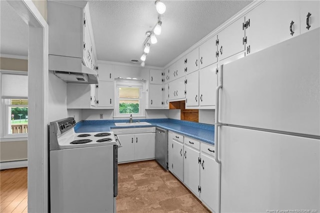 472 Walter Bright Rd, Sanford, NC 27330 - kitchen with white appliances, a sink, a baseboard heating unit, ventilation hood, and white cabinets