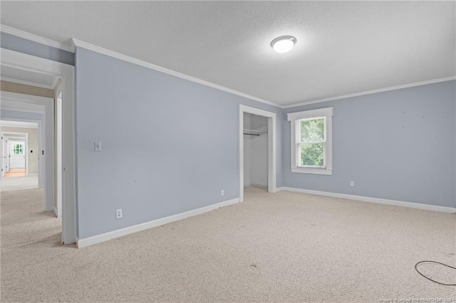 472 Walter Bright Rd, Sanford, NC 27330 - unfurnished bedroom featuring carpet floors, crown molding, baseboards, a closet, and a textured ceiling