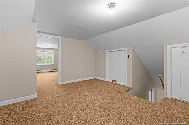 472 Walter Bright Rd, Sanford, NC 27330 - additional living space with a baseboard radiator, carpet floors, lofted ceiling, and baseboards