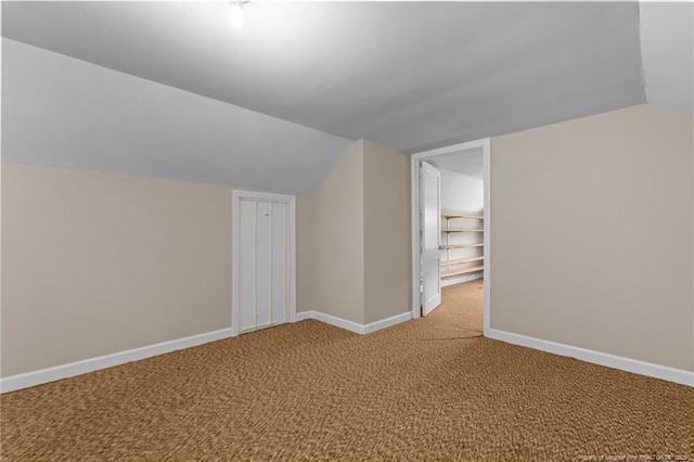 472 Walter Bright Rd, Sanford, NC 27330 - additional living space featuring lofted ceiling, light colored carpet, and baseboards