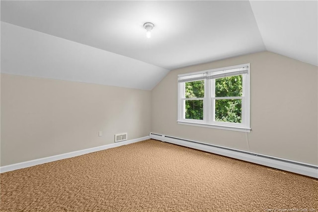 472 Walter Bright Rd, Sanford, NC 27330 - bonus room with vaulted ceiling, a baseboard heating unit, carpet, and baseboards