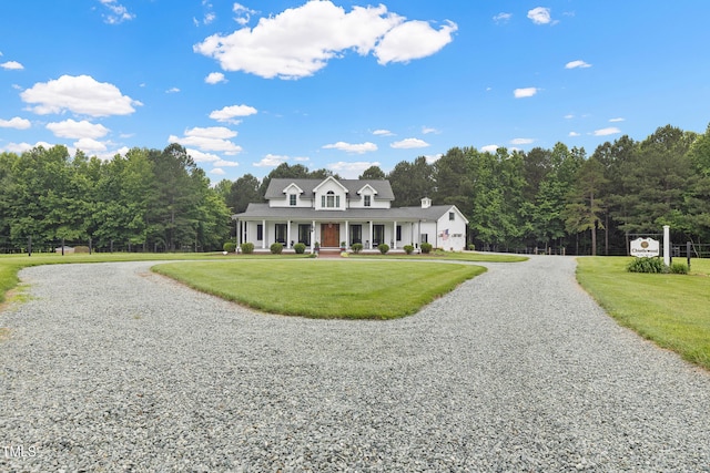 4737 Uzzle Rd, Rougemont, NC 27572 - view of front of home featuring covered porch, a front yard, and gravel driveway