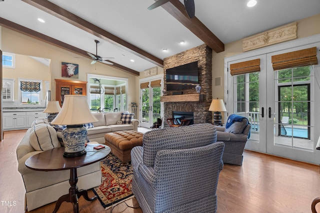 4737 Uzzle Rd, Rougemont, NC 27572 - living area with french doors, ceiling fan, a fireplace, wood finished floors, and recessed lighting