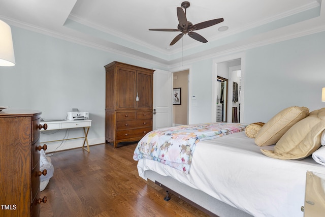 4737 Uzzle Rd, Rougemont, NC 27572 - bedroom featuring dark wood-style floors, a raised ceiling, ornamental molding, a spacious closet, and a closet
