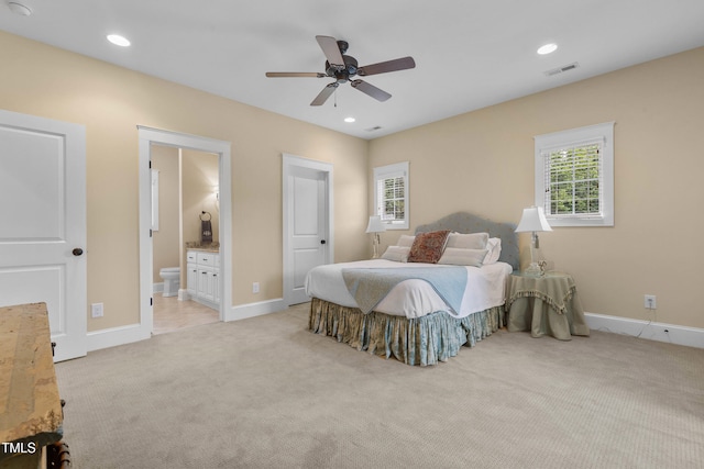 4737 Uzzle Rd, Rougemont, NC 27572 - bedroom featuring light colored carpet, baseboards, ensuite bath, recessed lighting, and ceiling fan