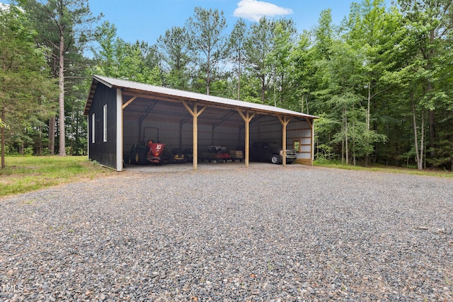 4737 Uzzle Rd, Rougemont, NC 27572 - garage with a detached carport and driveway