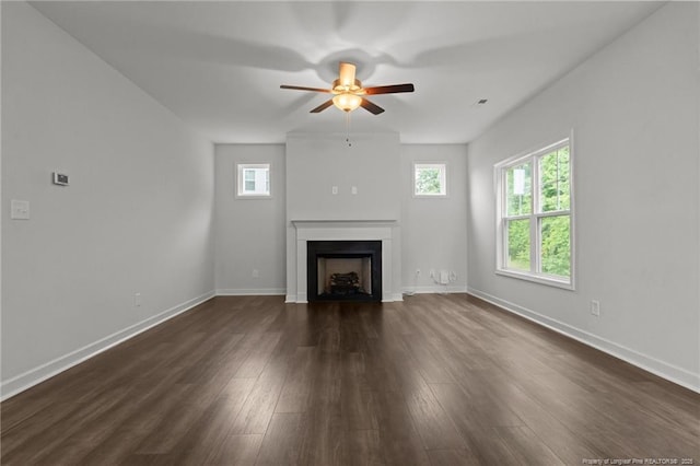 4616 Scenic Pines Dr, Hope Mills, NC 28348 - unfurnished living room with a fireplace, ceiling fan, dark wood-style floors, and baseboards