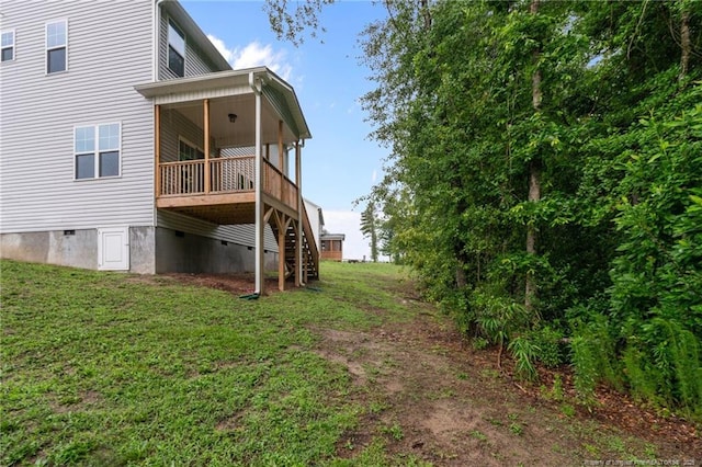 4616 Scenic Pines Dr, Hope Mills, NC 28348 - back of property with stairs, crawl space, a yard, and a wooden deck