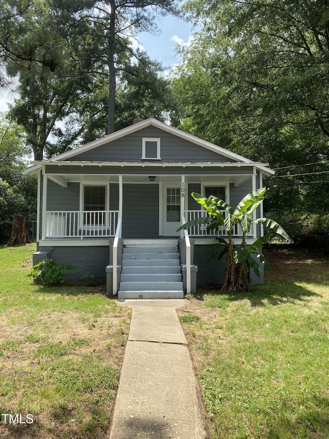 108 Herbert St, Durham, NC 27703 - bungalow with a porch, a front lawn, and stairs