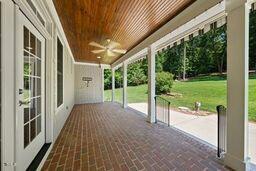 311 Rassie Crabtree Rd, Rougemont, NC 27572 - unfurnished sunroom with a ceiling fan