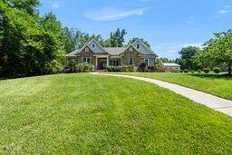 311 Rassie Crabtree Rd, Rougemont, NC 27572 - ranch-style house with a front lawn