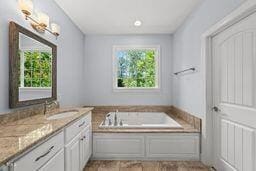 311 Rassie Crabtree Rd, Rougemont, NC 27572 - full bathroom with vanity and a bath