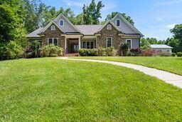 311 Rassie Crabtree Rd, Rougemont, NC 27572 - craftsman-style home with a front lawn
