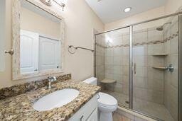 311 Rassie Crabtree Rd, Rougemont, NC 27572 - full bathroom with vanity, a shower stall, and recessed lighting