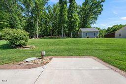 311 Rassie Crabtree Rd, Rougemont, NC 27572 - view of green lawn