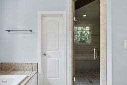 311 Rassie Crabtree Rd, Rougemont, NC 27572 - bathroom with a shower stall and vanity