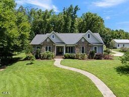 311 Rassie Crabtree Rd, Rougemont, NC 27572 - single story home with a front yard
