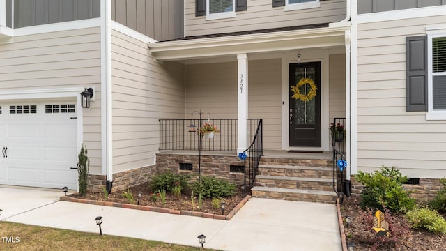 3421 Lebrun Path, Fuquay Varina, NC 27526 - property entrance with a garage and covered porch