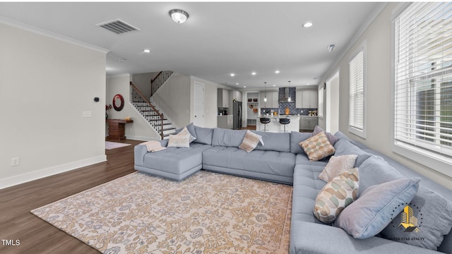 3421 Lebrun Path, Fuquay Varina, NC 27526 - living room featuring recessed lighting, stairway, dark wood finished floors, and crown molding