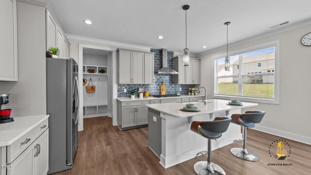 3421 Lebrun Path, Fuquay Varina, NC 27526 - kitchen with stainless steel fridge with ice dispenser, wall chimney range hood, gas stovetop, light countertops, and recessed lighting