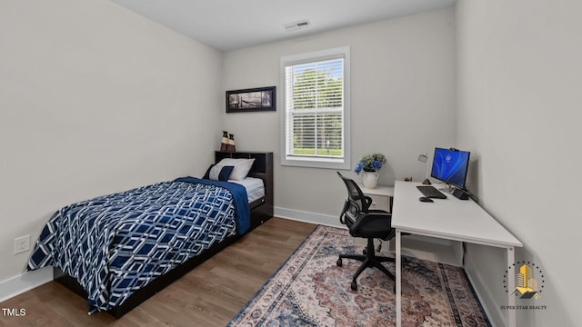 3421 Lebrun Path, Fuquay Varina, NC 27526 - bedroom with wood finished floors and an office area