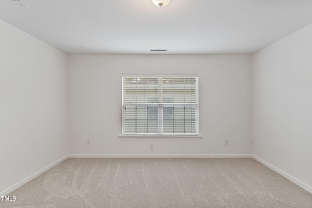 518 Emerald Downs Rd, Cary, NC 27519 - unfurnished room featuring light carpet and baseboards