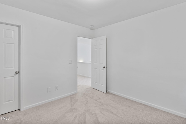 518 Emerald Downs Rd, Cary, NC 27519 - carpeted empty room with baseboards