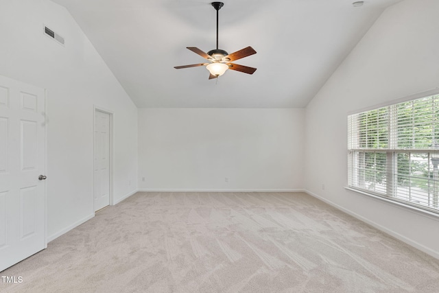518 Emerald Downs Rd, Cary, NC 27519 - spare room with a ceiling fan, light carpet, and high vaulted ceiling