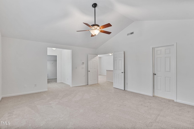 518 Emerald Downs Rd, Cary, NC 27519 - unfurnished bedroom with a spacious closet, light colored carpet, high vaulted ceiling, and ceiling fan