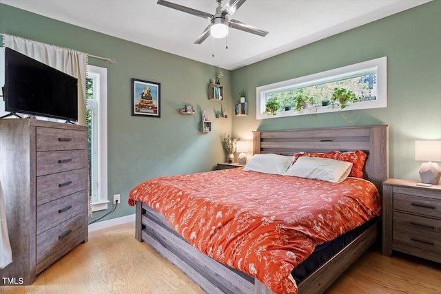 1314 S E St, Raleigh, NC 27601 - bedroom featuring wood finished floors, a ceiling fan, and baseboards