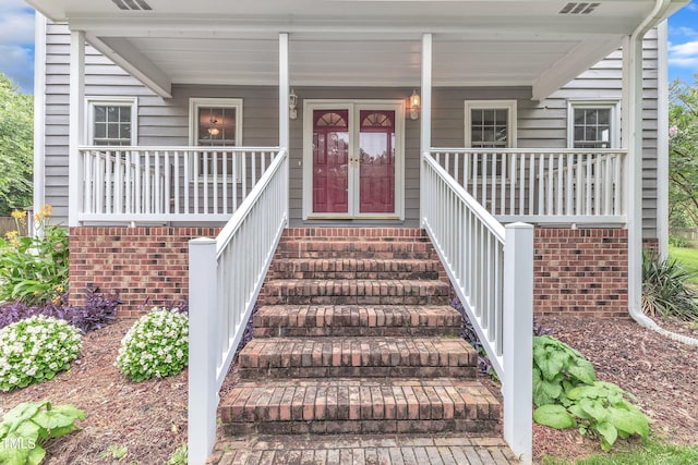 8121 Bentwood Pl, Raleigh, NC 27615 - entrance to property featuring covered porch