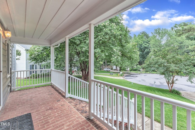 8121 Bentwood Pl, Raleigh, NC 27615 - porch featuring a yard