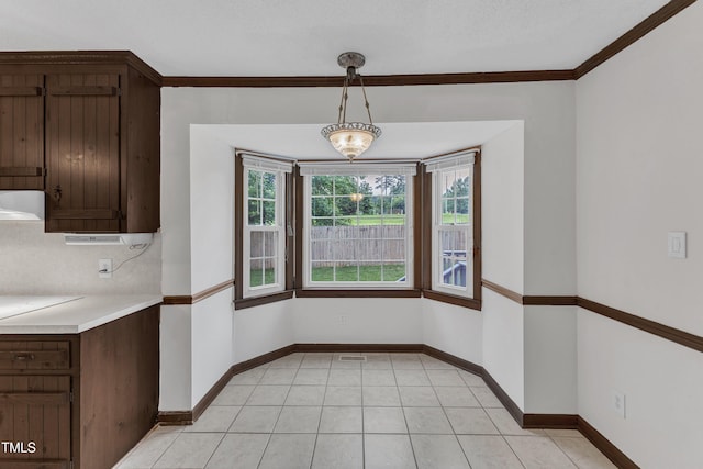 8121 Bentwood Pl, Raleigh, NC 27615 - unfurnished dining area featuring baseboards and ornamental molding