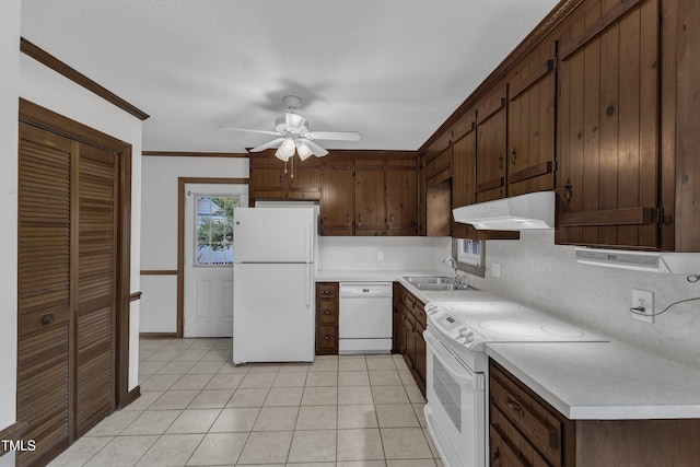 8121 Bentwood Pl, Raleigh, NC 27615 - kitchen featuring white appliances, under cabinet range hood, light countertops, a ceiling fan, and ornamental molding