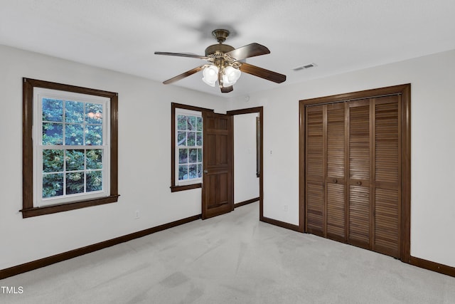 8121 Bentwood Pl, Raleigh, NC 27615 - unfurnished bedroom with baseboards, light carpet, and a closet