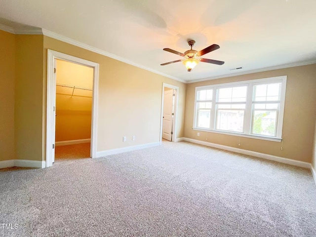 115 Ballyliffen Ln, Cary, NC 27519 - unfurnished room with light colored carpet, crown molding, a ceiling fan, and baseboards