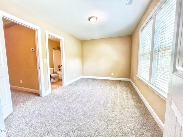 115 Ballyliffen Ln, Cary, NC 27519 - spare room featuring carpet and baseboards